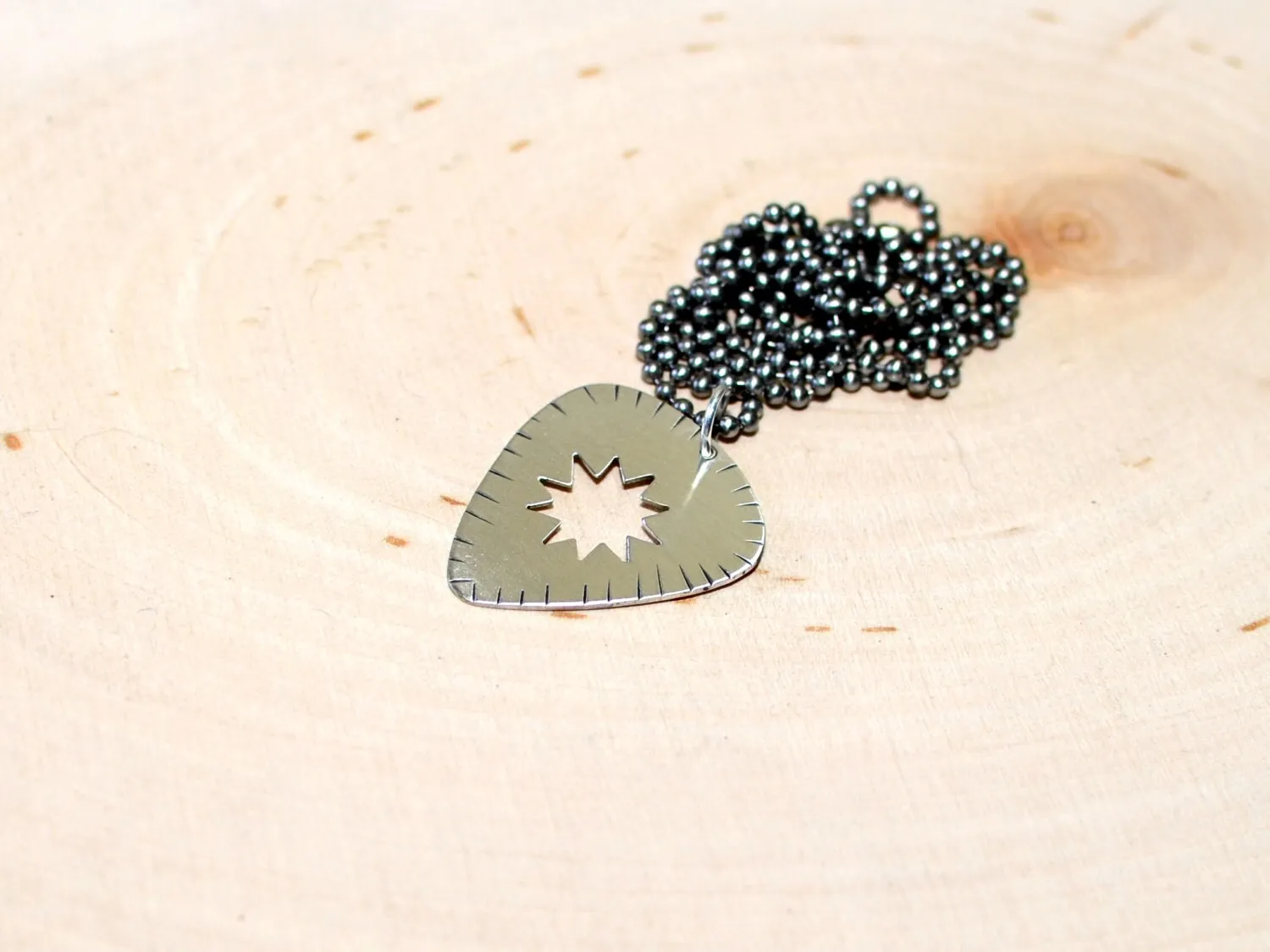 Sterling silver guitar pick necklace